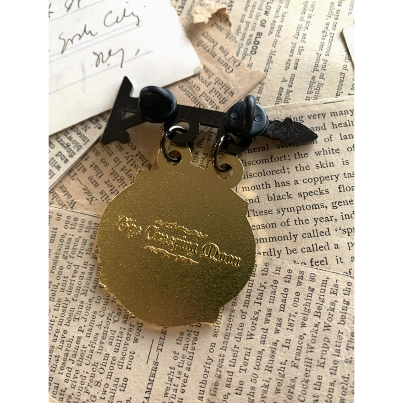 The Creeping Moon Enamel Pin - Cafe Shop Sign
