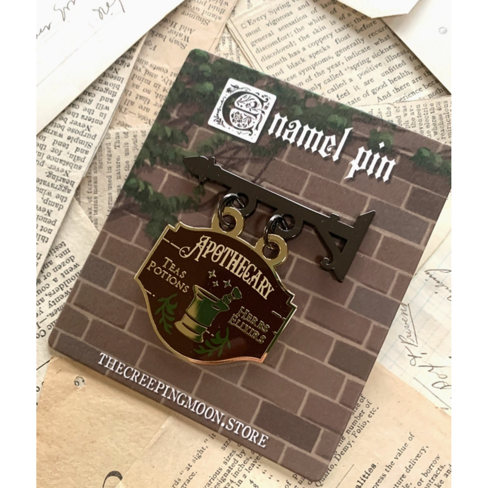 The Creeping Moon Enamel Pin - Apothecary Shop Sign