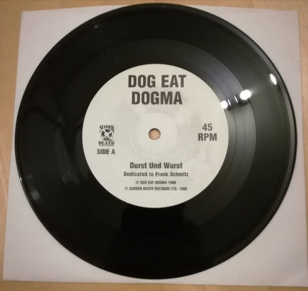 Rock/Pop D.O.A. / Dog Eat Dogma - Nervous Breakdown / Durst Und Wurst ('99 CA 7") (NM)