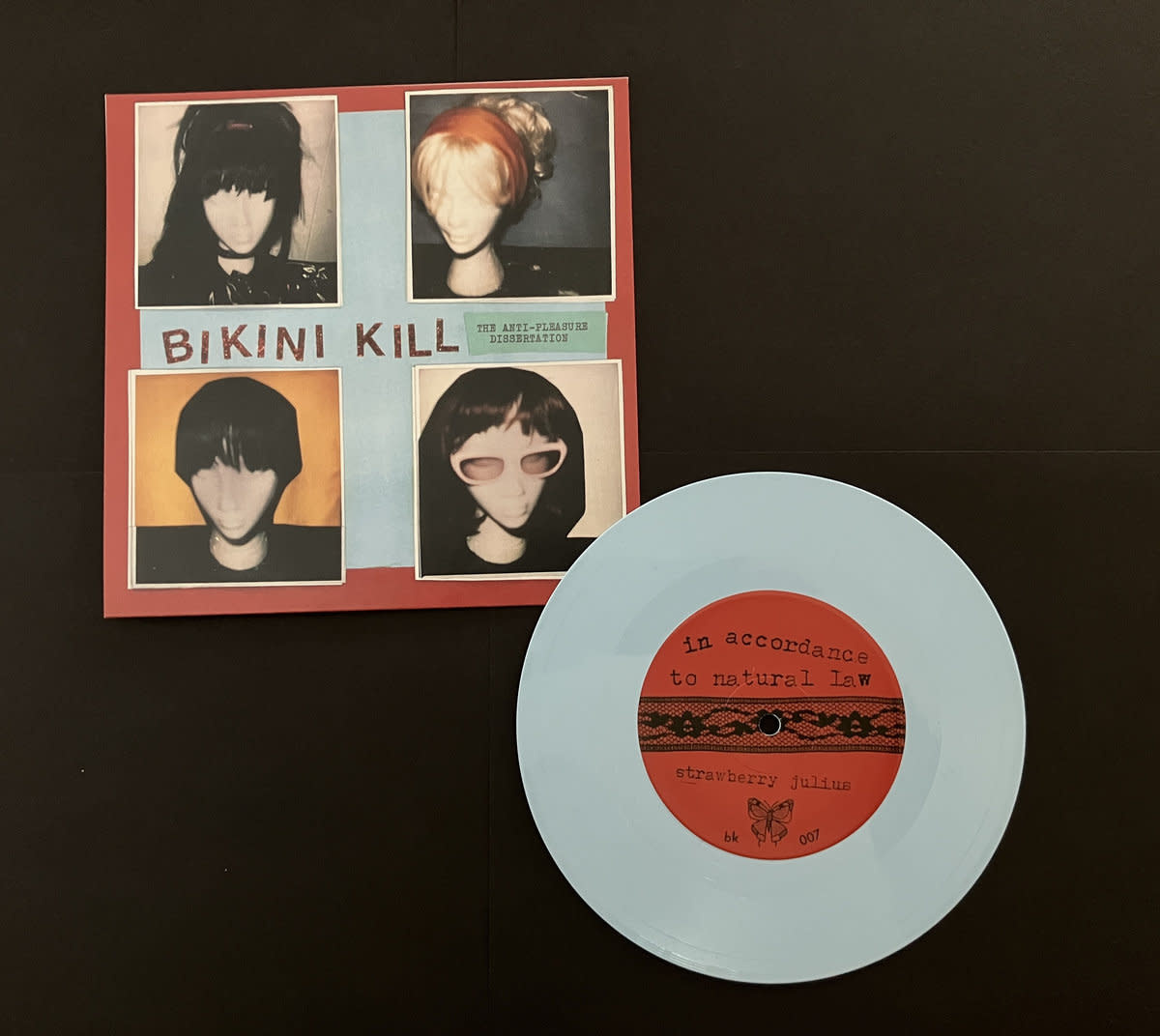 Punk/Hardcore Bikini Kill - The Anti-Pleasure Dissertation (Sky Blue Vinyl 7")