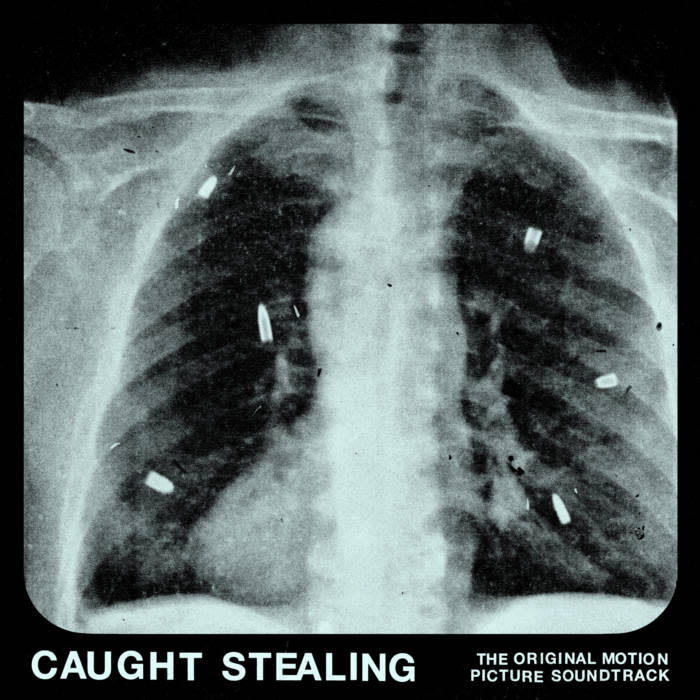 Soundtracks Idles featuring Rob Simonsen - Caught Stealing (Soundtrack) (White Vinyl) *OVERSTOCK 20% OFF!* ($34.99 -> $27.99)