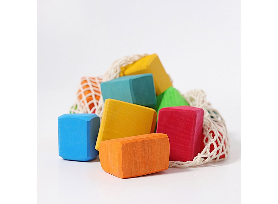 Multicoloured blocks in net bag