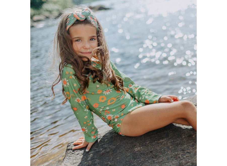 Green one-piece swimsuit with flower pattern