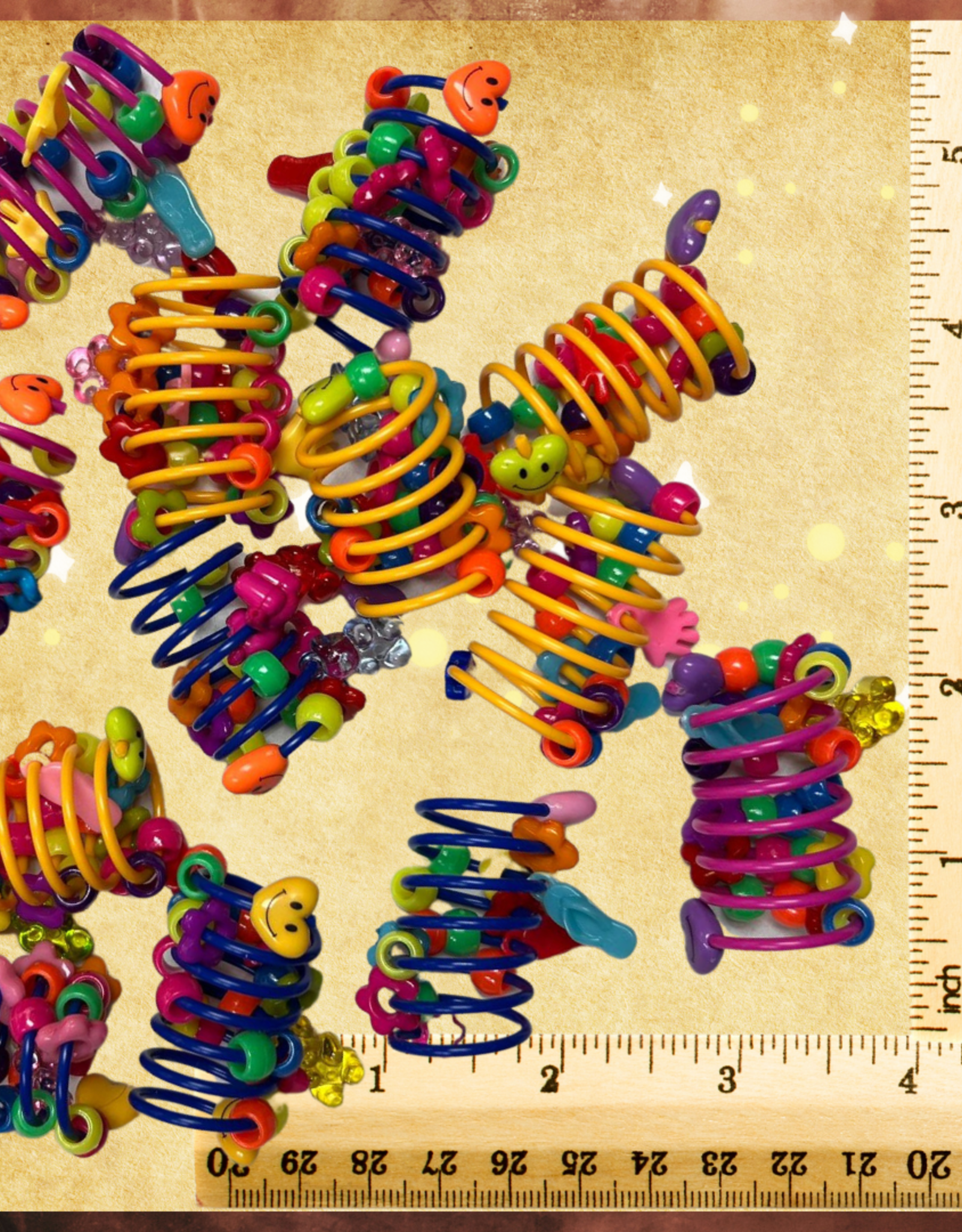 FOOT TOY- PLASTIC- 1.5X1.5X3- SPRINGY THINGY