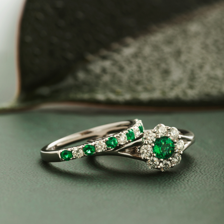 Expressions Jewelers 18KW Emerald & Diamond Band
