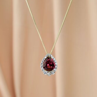 Expressions Jewelers Rhodolite Garnet and Diamond Halo Necklace