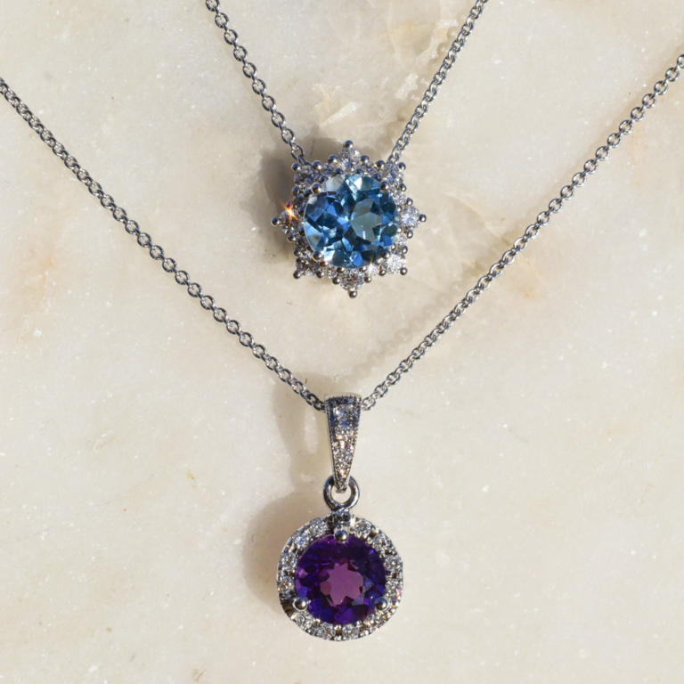 Expressions Jewelers Blue Topaz and Diamond Necklace