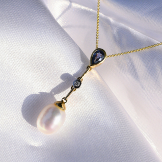Expressions Jewelers Pearl, Sapphire, and Diamond Necklace