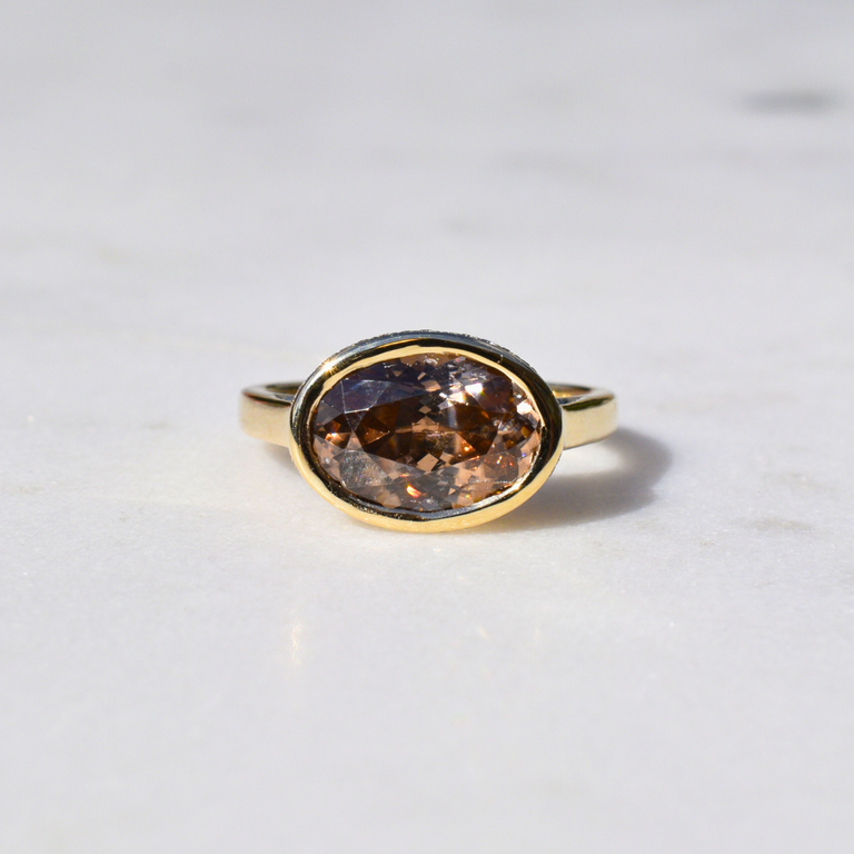 Expressions Jewelers 14K Yellow Gold Oval Brown Zircon Ring with Hidden Diamond Halo
