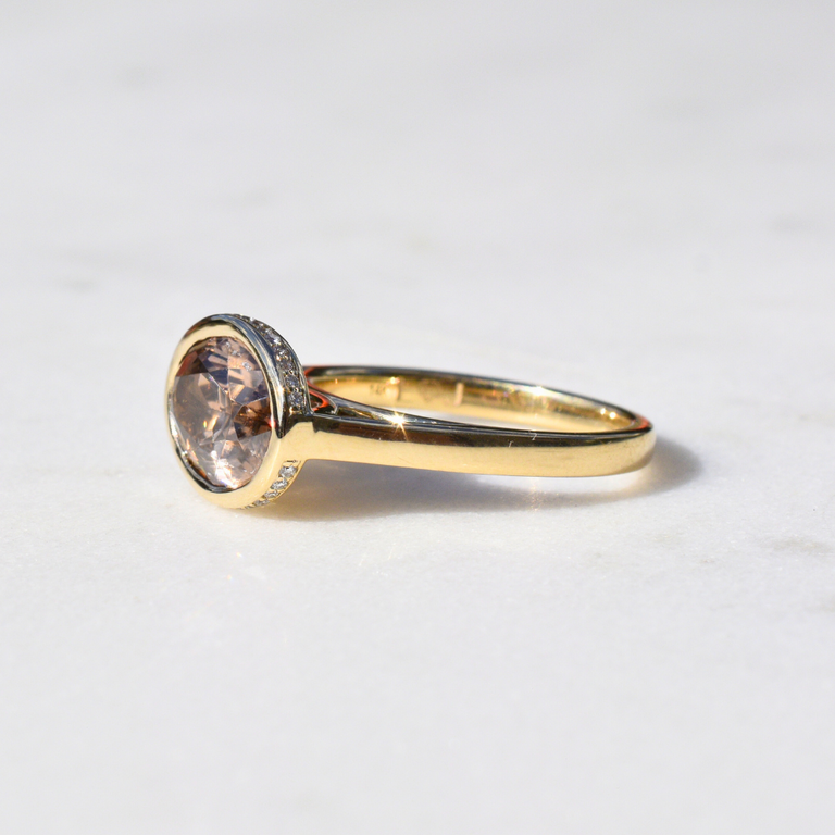 Expressions Jewelers 14K Yellow Gold Oval Brown Zircon Ring with Hidden Diamond Halo