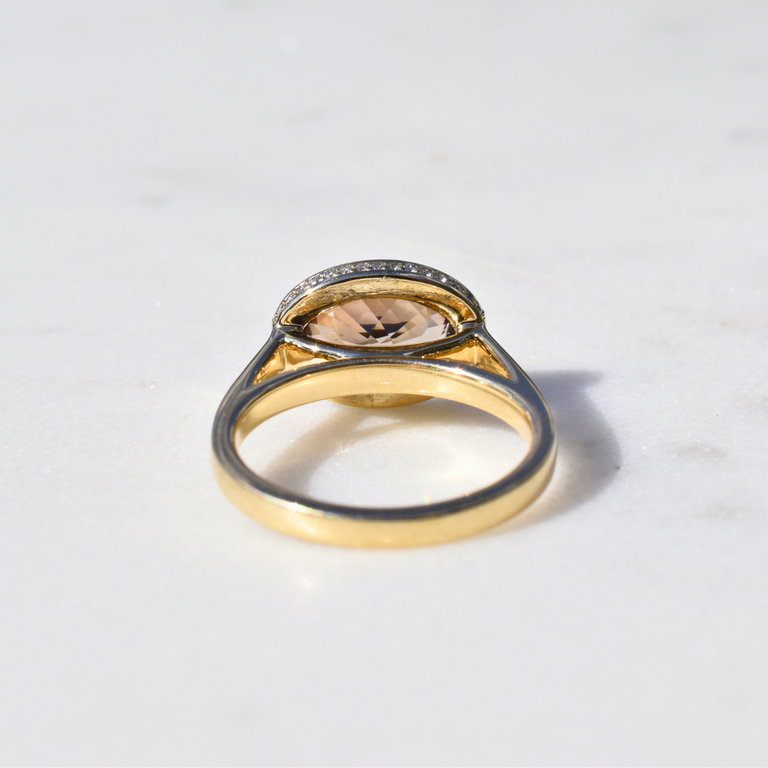 Expressions Jewelers 14K Yellow Gold Oval Brown Zircon Ring with Hidden Diamond Halo