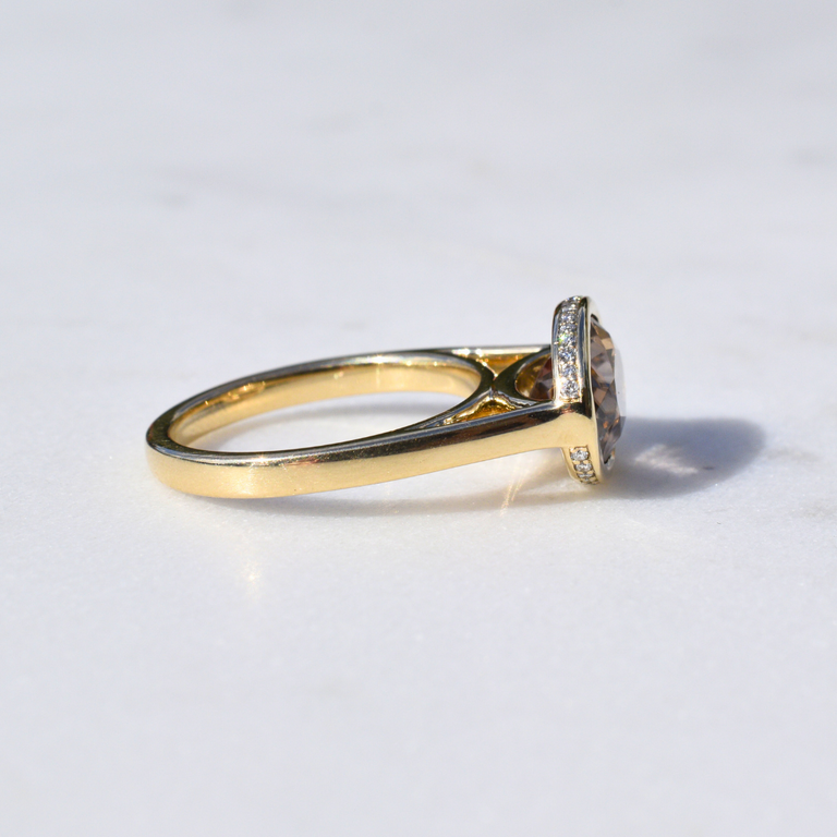 Expressions Jewelers 14K Yellow Gold Oval Brown Zircon Ring with Hidden Diamond Halo