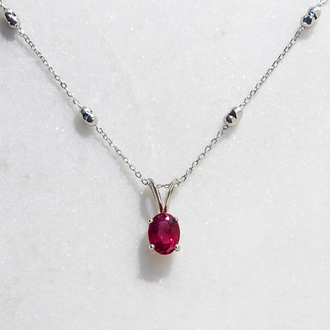 Expressions Jewelers Oval Rhodolite Garnet Pendant