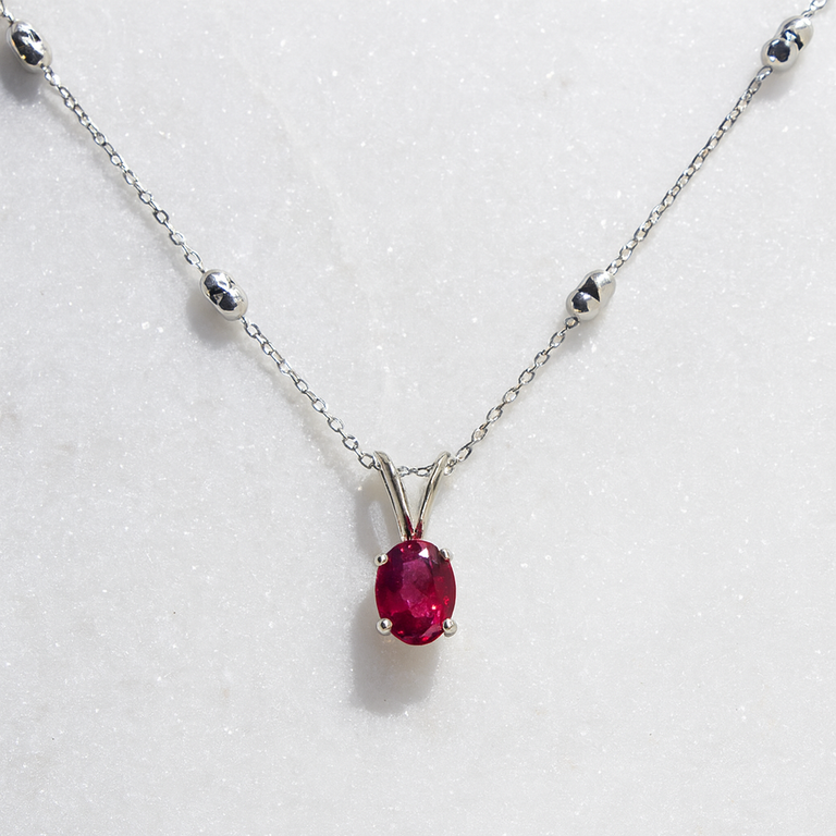 Expressions Jewelers 14K Oval Rhodolite Garnet Pendant