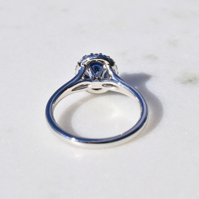 Expressions Jewelers Sapphire and Diamond Halo Ring