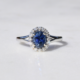 Expressions Jewelers Sapphire and Diamond Halo Ring