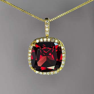 Expressions Jewelers Cushion Garnet and Diamond Halo Pendant