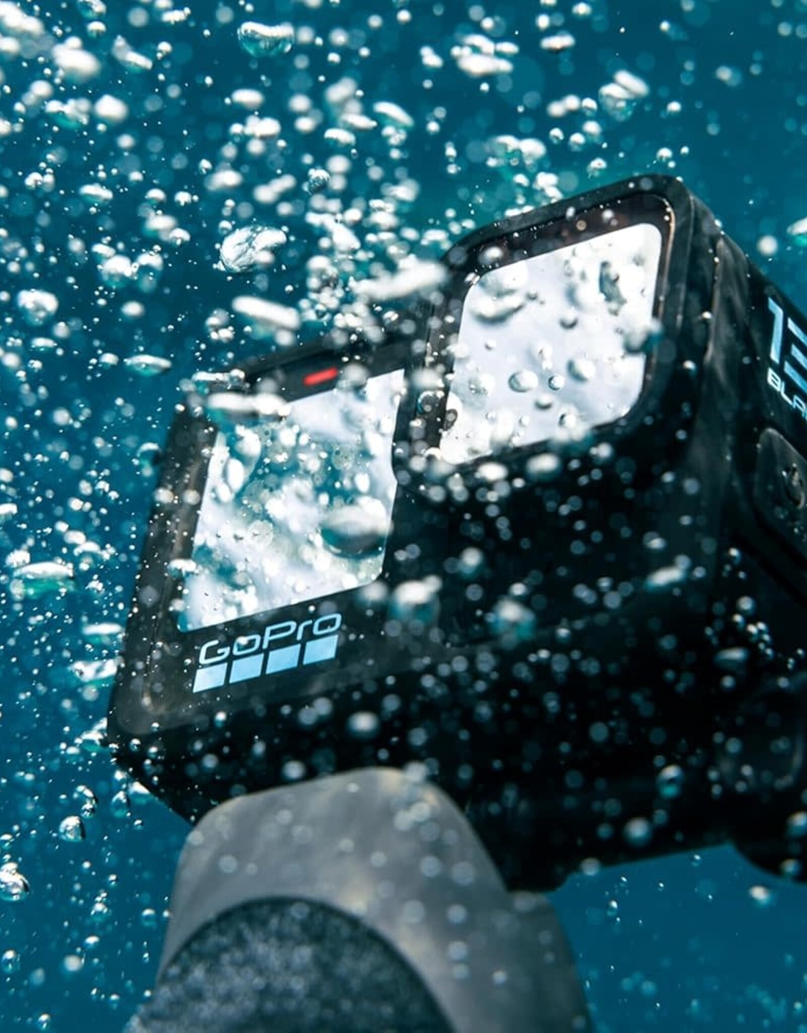 GoPro HERO13 Black Accessory Bundle - Includes The Handler, 2 Enduro Batteries, 2 Curved Adhesive Mounts, 64GB SanDisk MicroSD Card, and Carrying Case