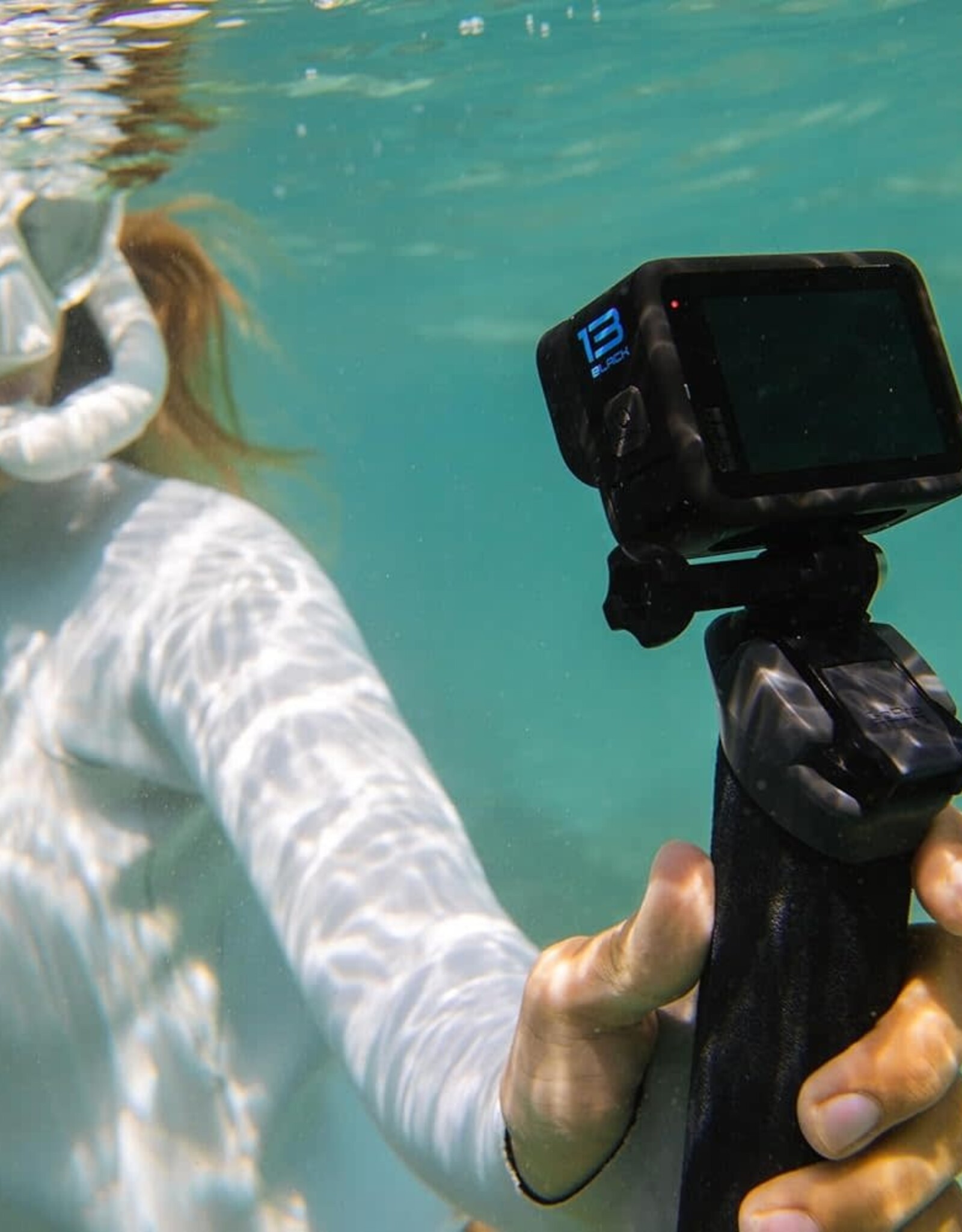 GoPro HERO13 Black Accessory Bundle - Includes The Handler, 2 Enduro Batteries, 2 Curved Adhesive Mounts, 64GB SanDisk MicroSD Card, and Carrying Case