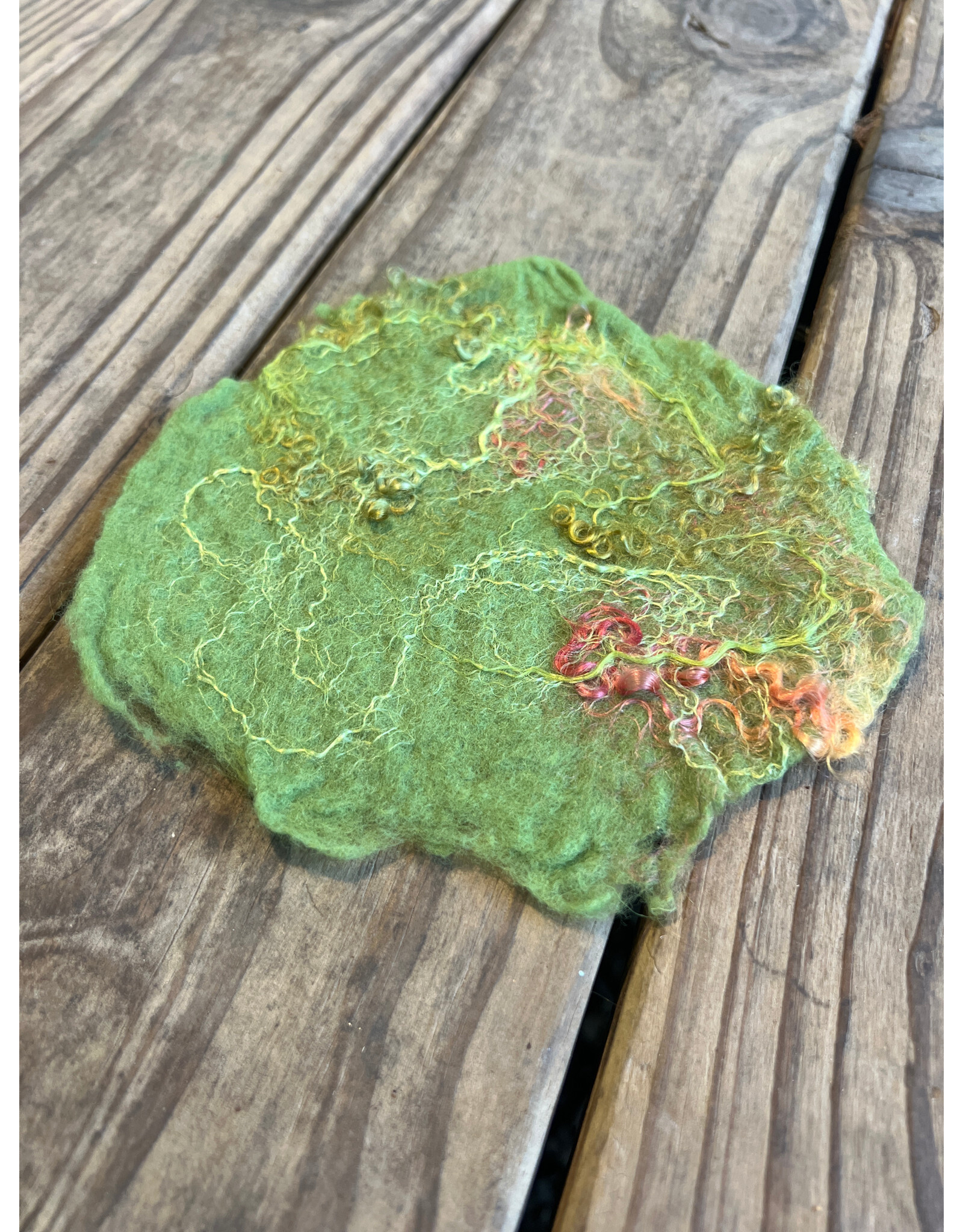 Green Felted Meadow Mat. small. 6in. by Claudia Kunz