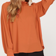 SSSS8003 - LONG SLEEVE WOVEN TOP WITH RUFFLED NECK