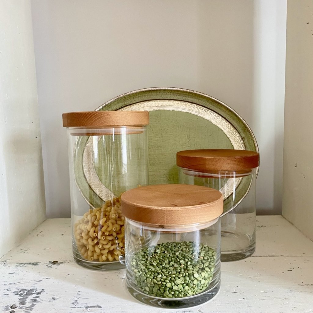 Small glass storage jar with bamboo lid