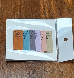 Coley Handmade leather tags vertical