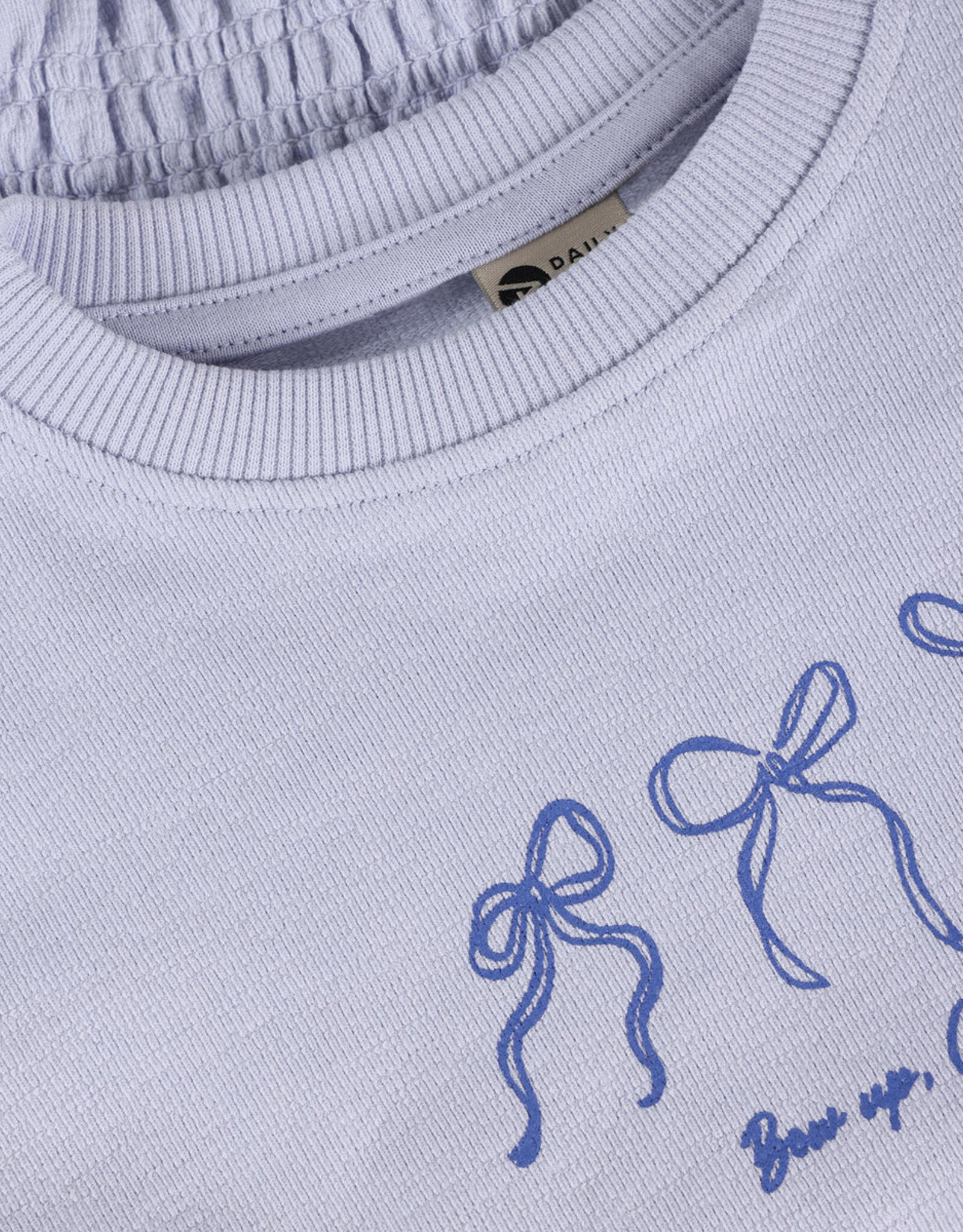 Daily Seven SP26 G Bows T-Shirt