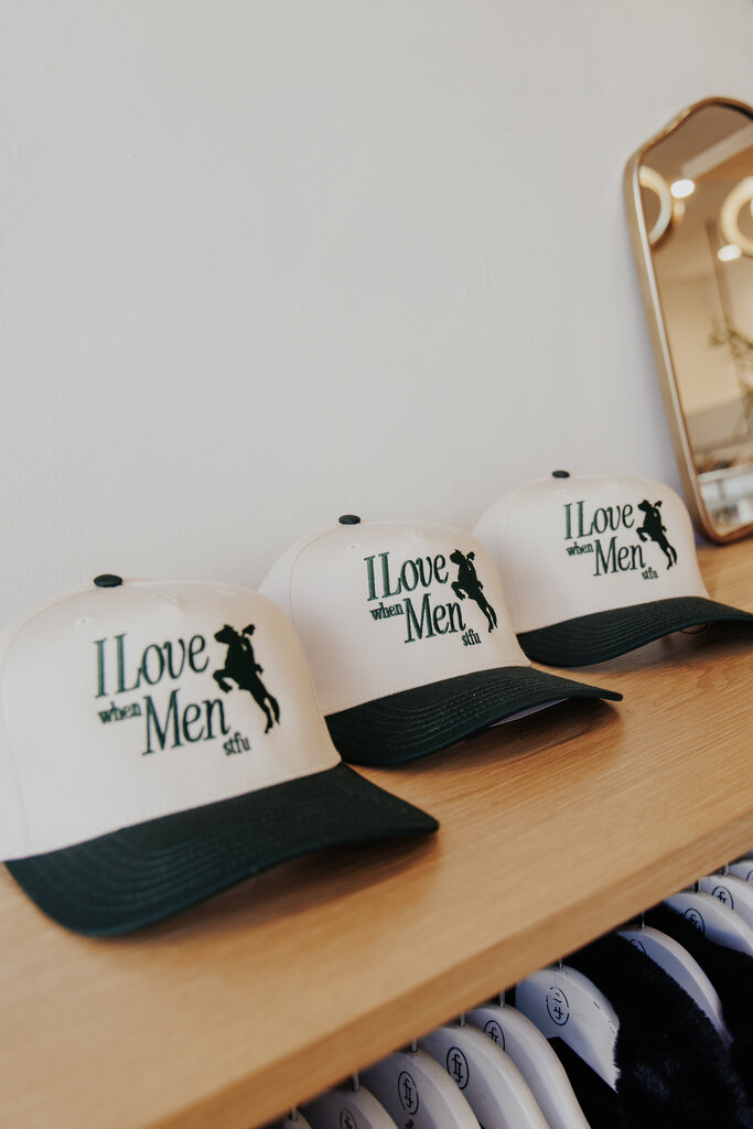 RAW AND REBELLIOUS I LOVE MEN TRUCKER HAT