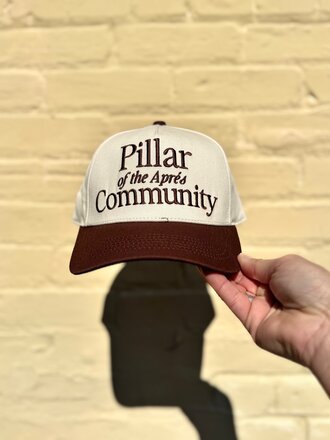 RAW AND REBELLIOUS PILLAR OF APRES TRUCKER HAT