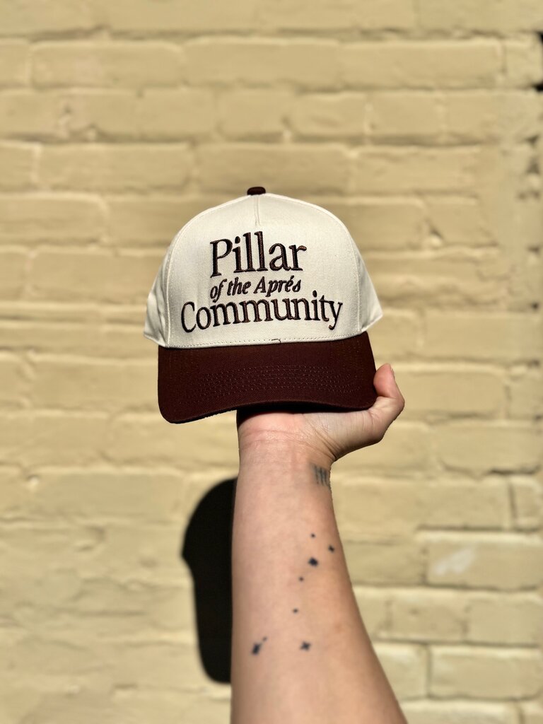 RAW AND REBELLIOUS PILLAR OF APRES TRUCKER HAT