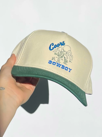 RAW AND REBELLIOUS COORS COWBOY TRUCKER HAT