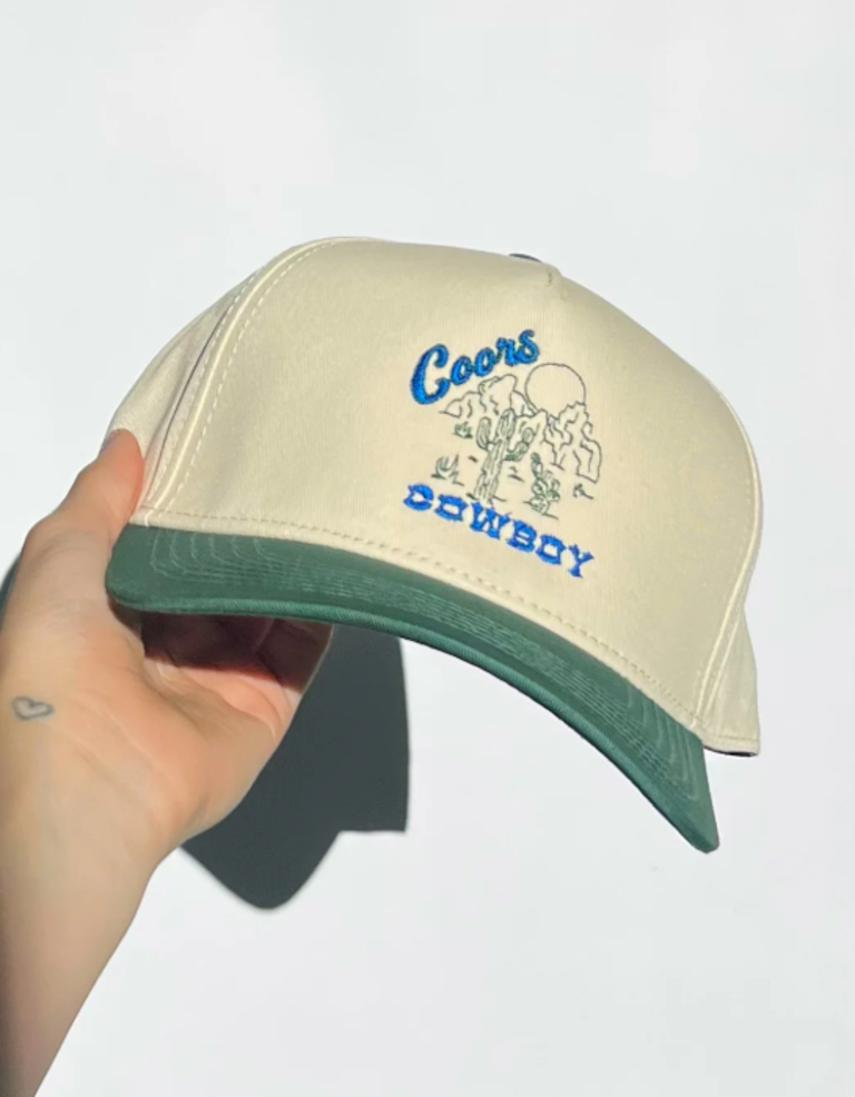 RAW AND REBELLIOUS COORS COWBOY TRUCKER HAT