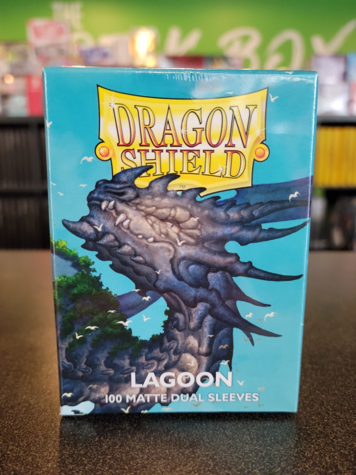 DRAGON SHIELD SLEEVES MATTE DUAL LAGOON100CT The Deck Box