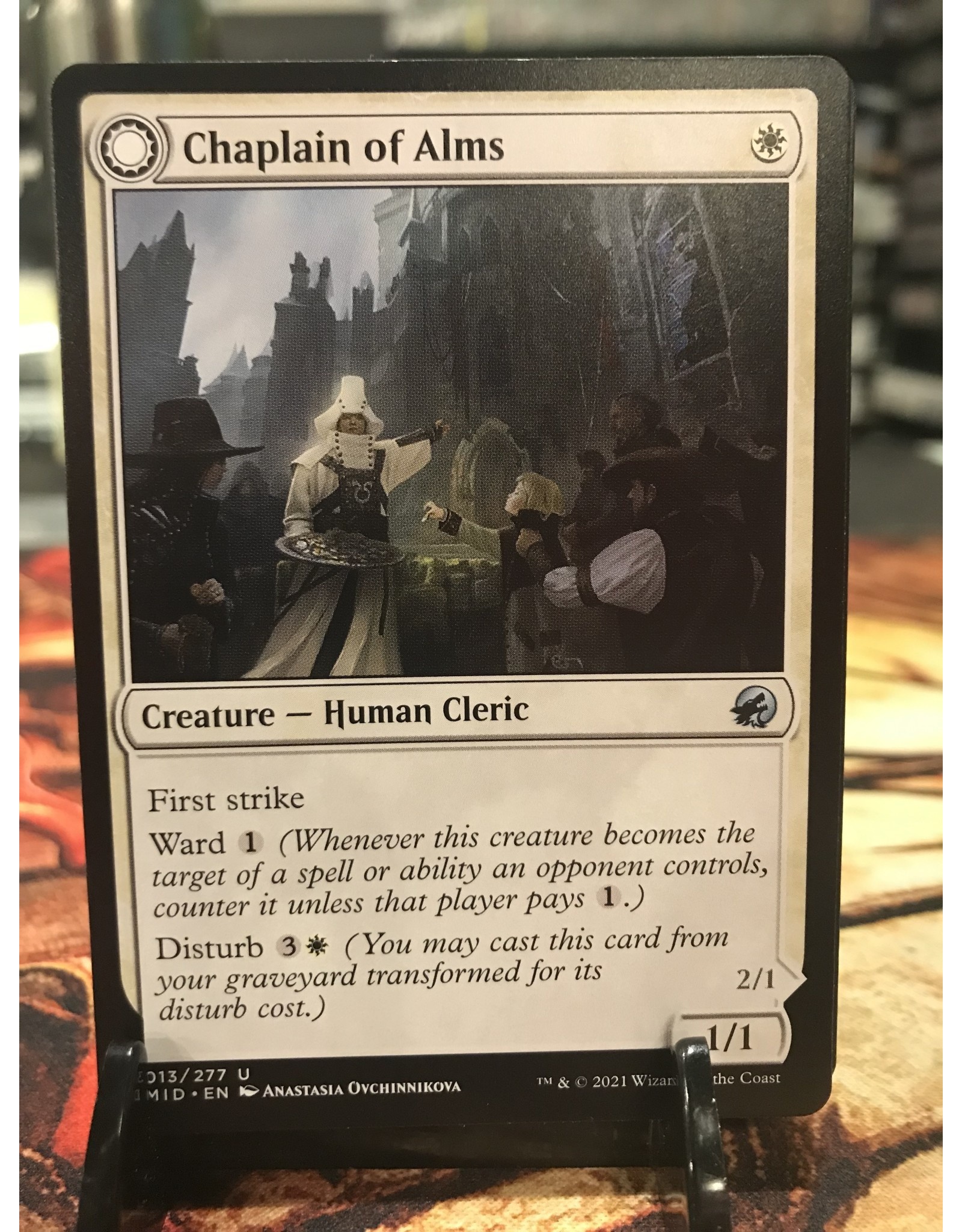 Magic Chaplain of Alms // Chapel Shieldgeist  (MID)
