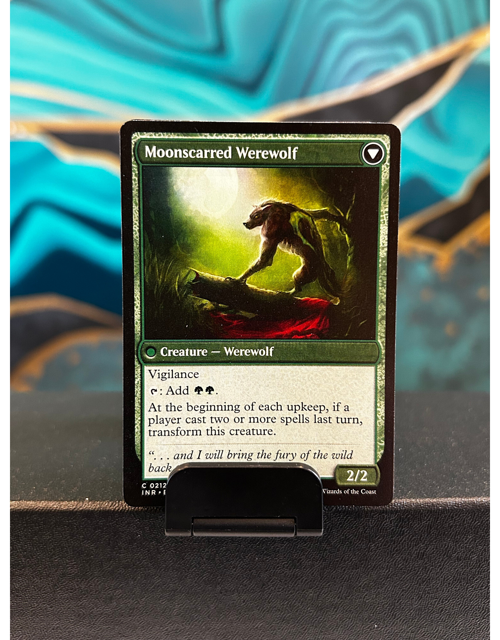 Scorned Villager // Moonscarred Werewolf  (INR)