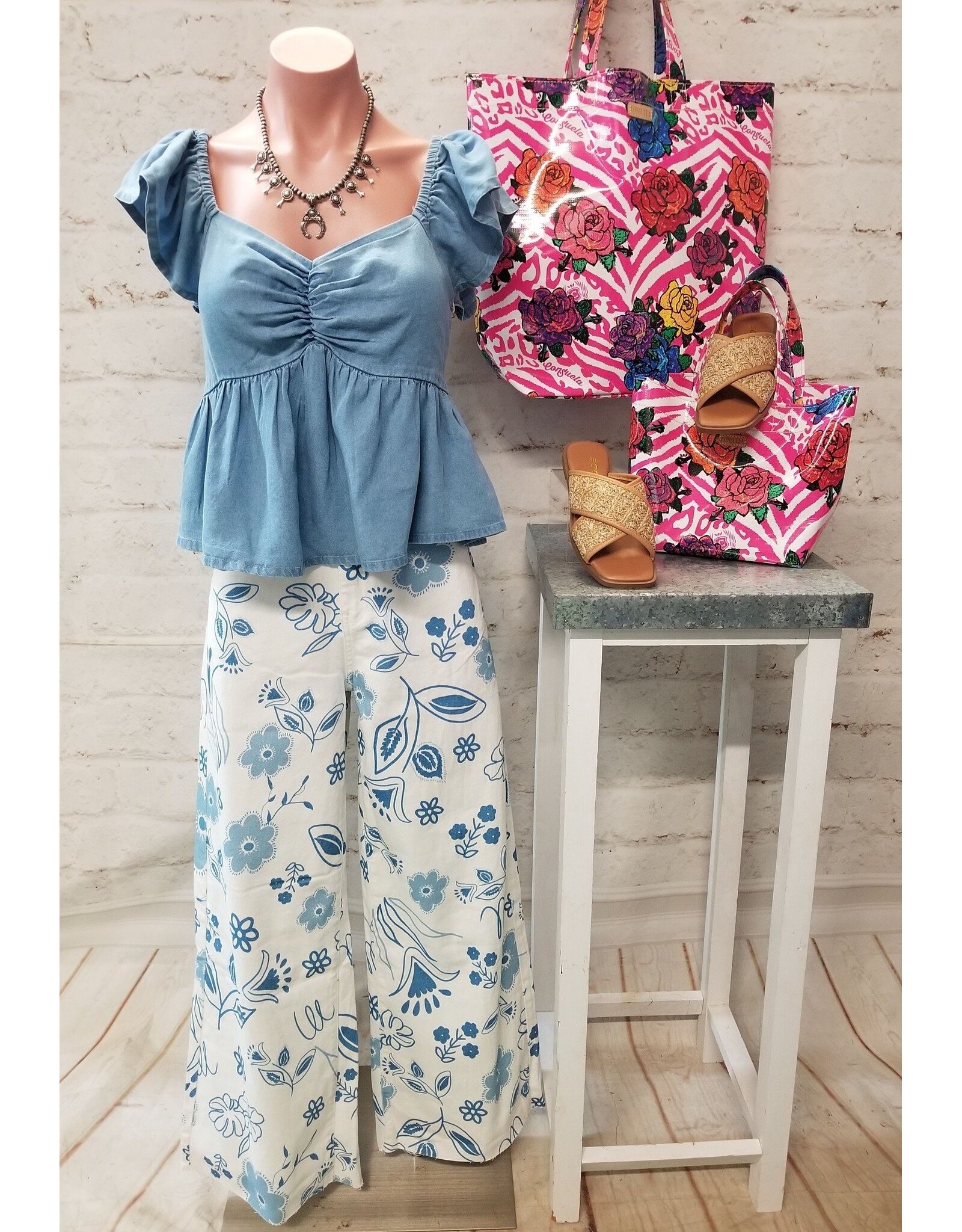 The Daisy Denim Peasant Top