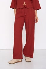24COLOURS TRUE RED TIE PANTS