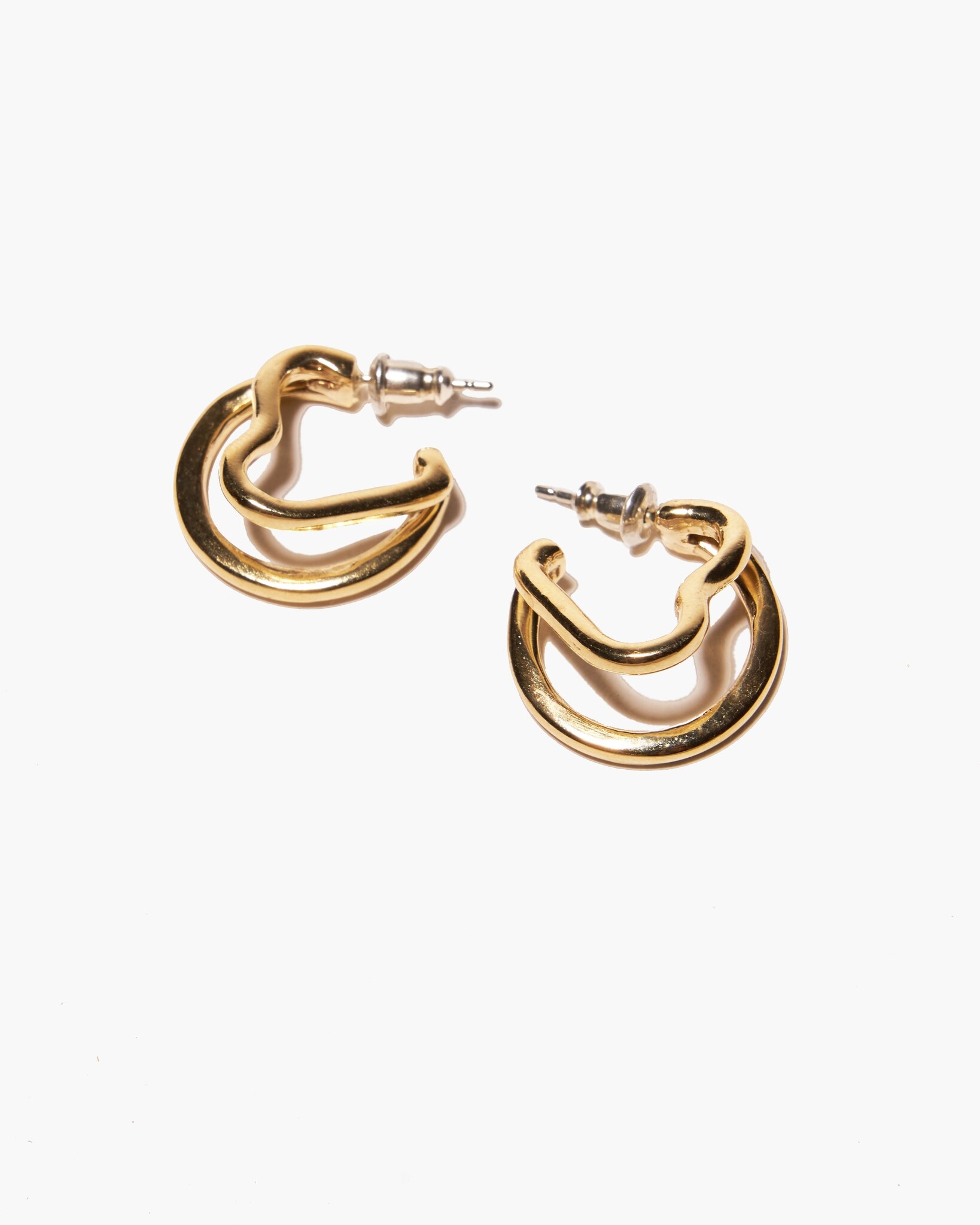 ODETTE EROS HOOP EARRINGS IN BRASS