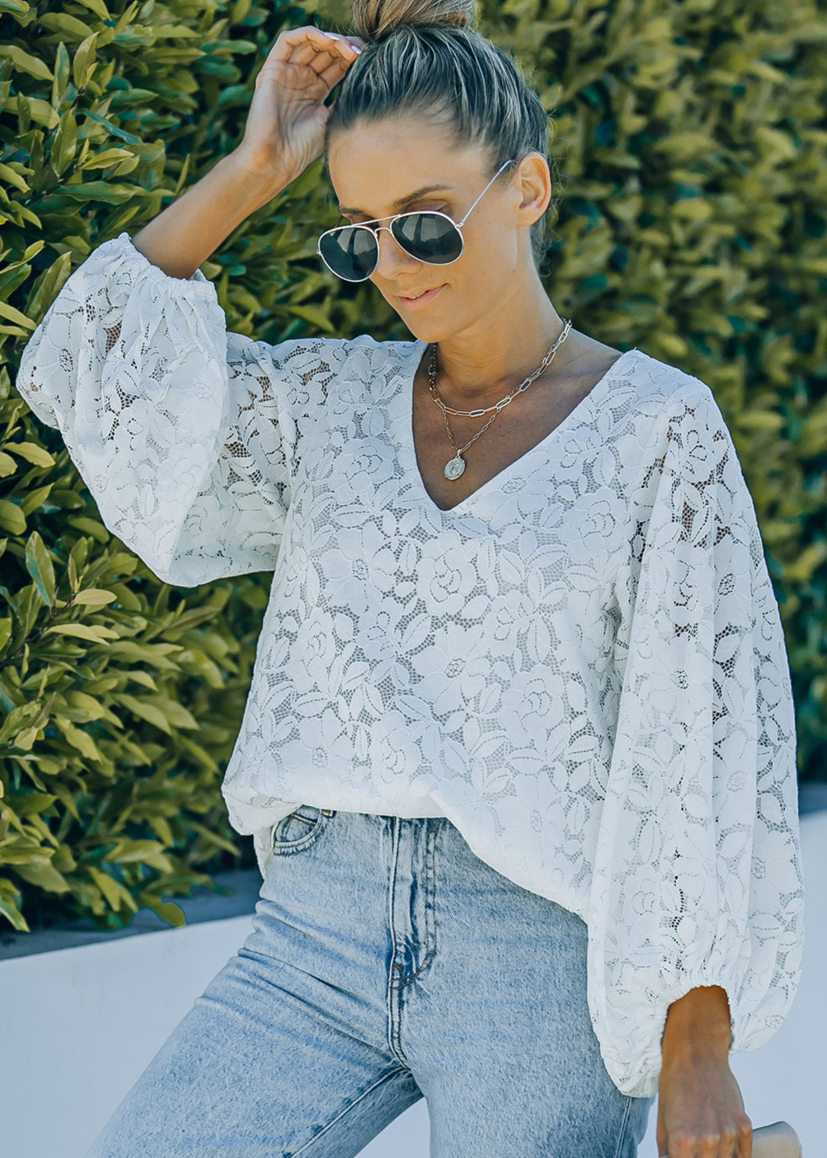 Lace puff blouse in floral pattern Towne Boutique