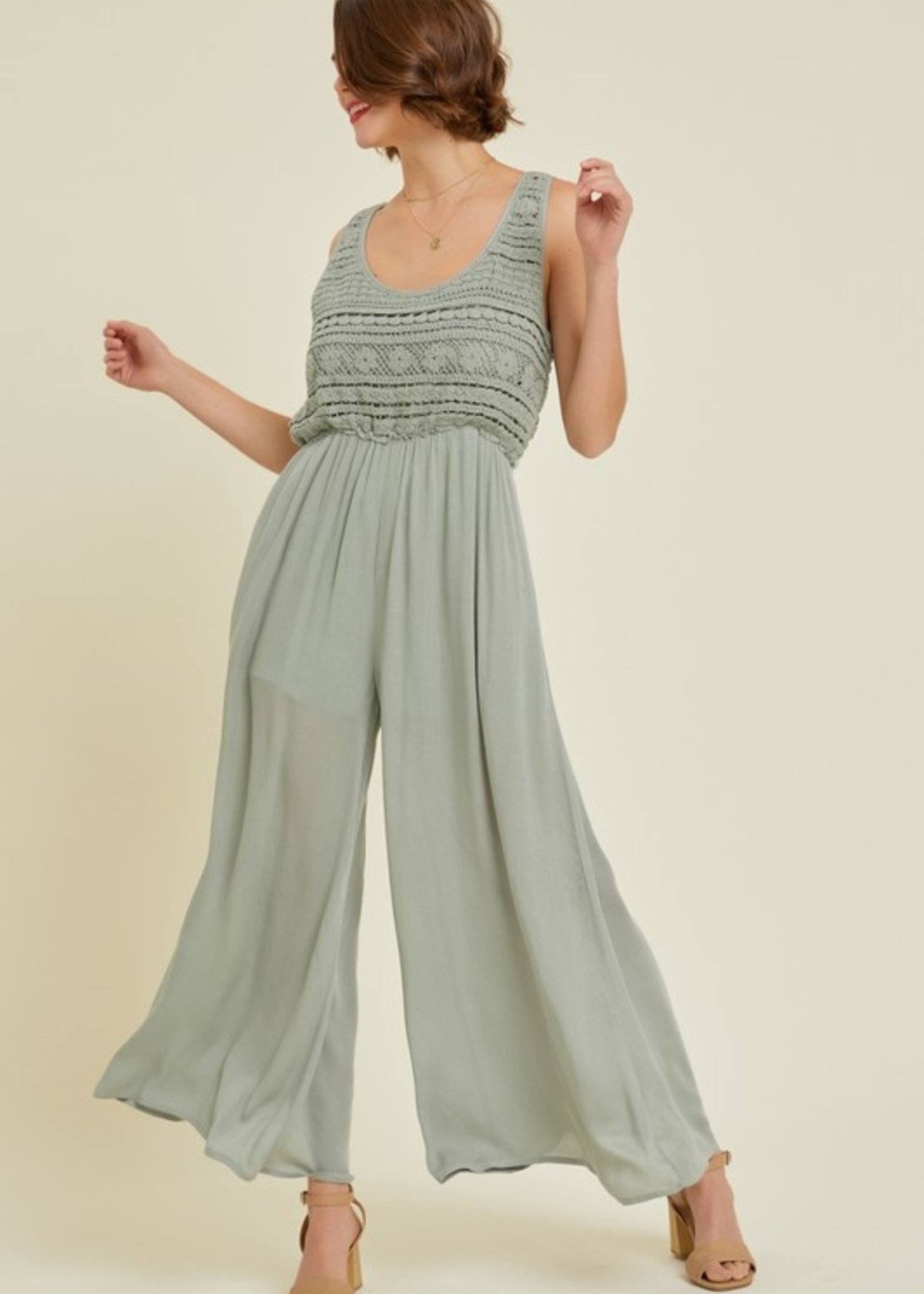 https://cdn.shoplightspeed.com/shops/635846/files/53974059/1652x2313x1/crochet-top-jumpsuit-2-colors.jpg