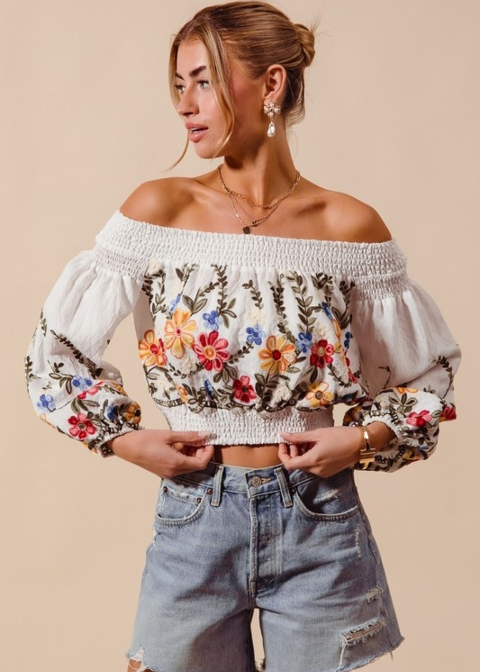 Embroidered off shoulder top