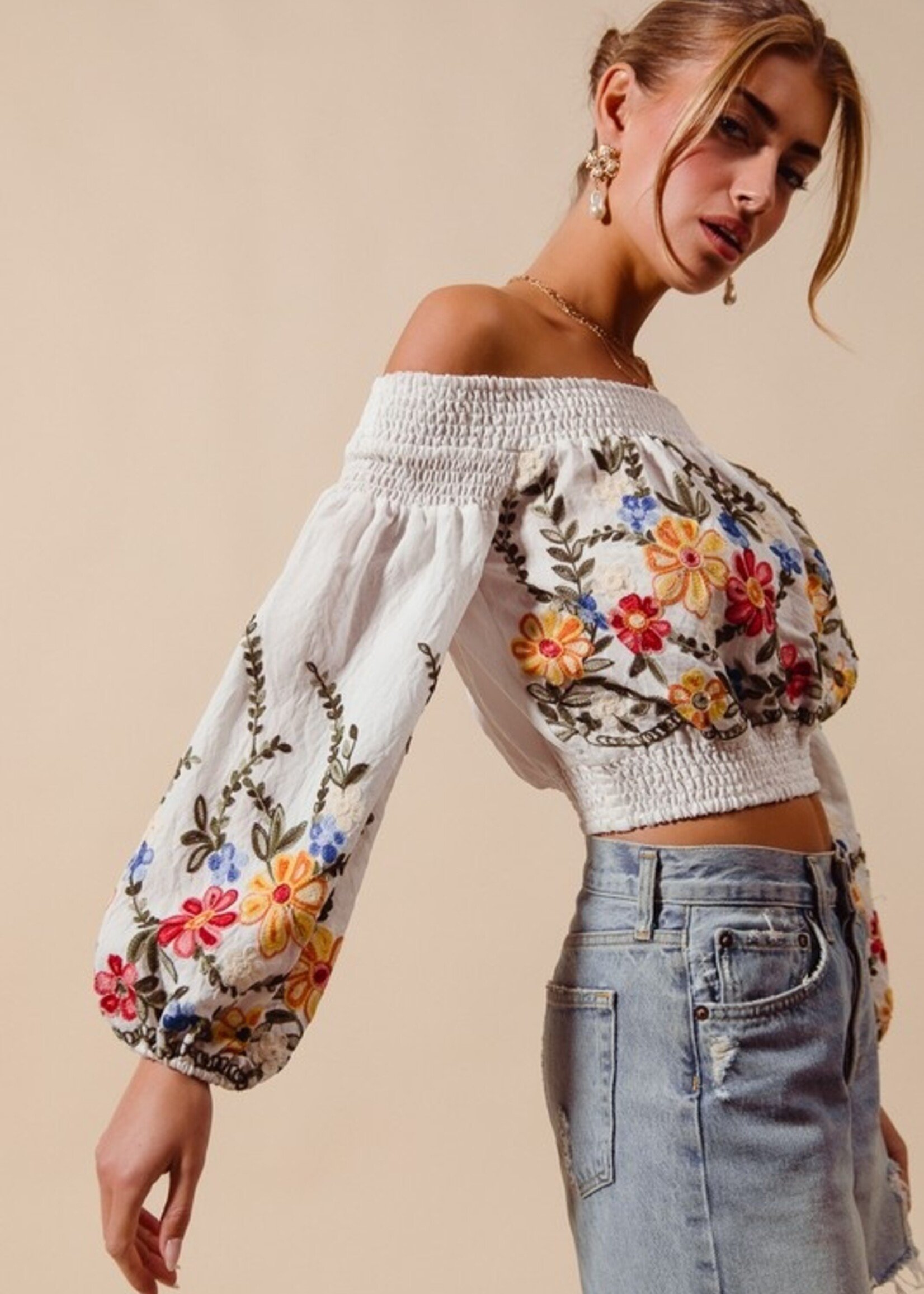 Embroidered off shoulder top