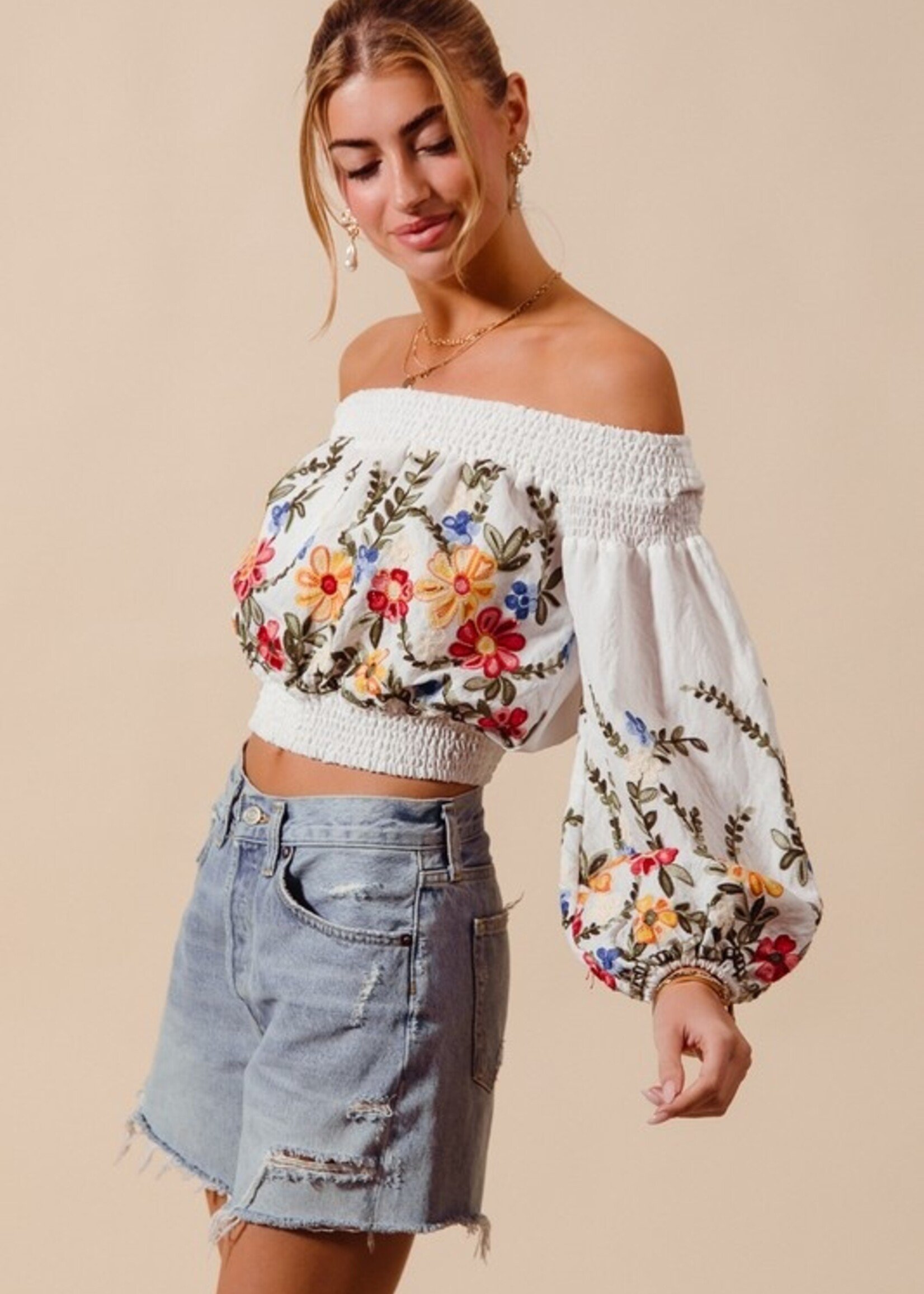 Embroidered off shoulder top