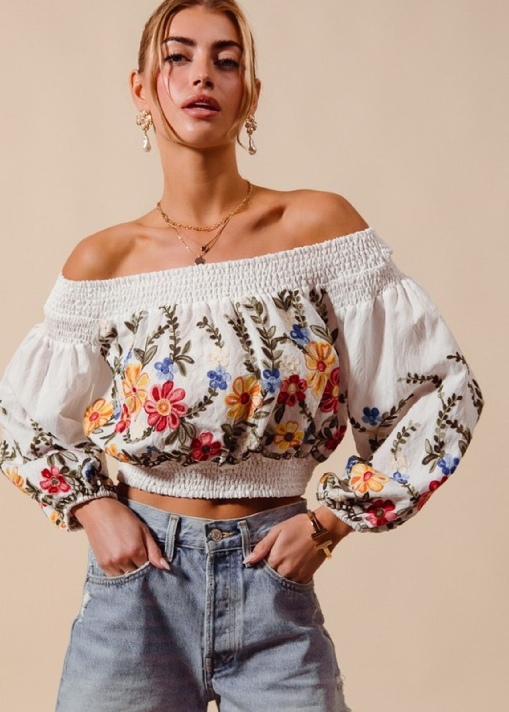 Embroidered off shoulder top