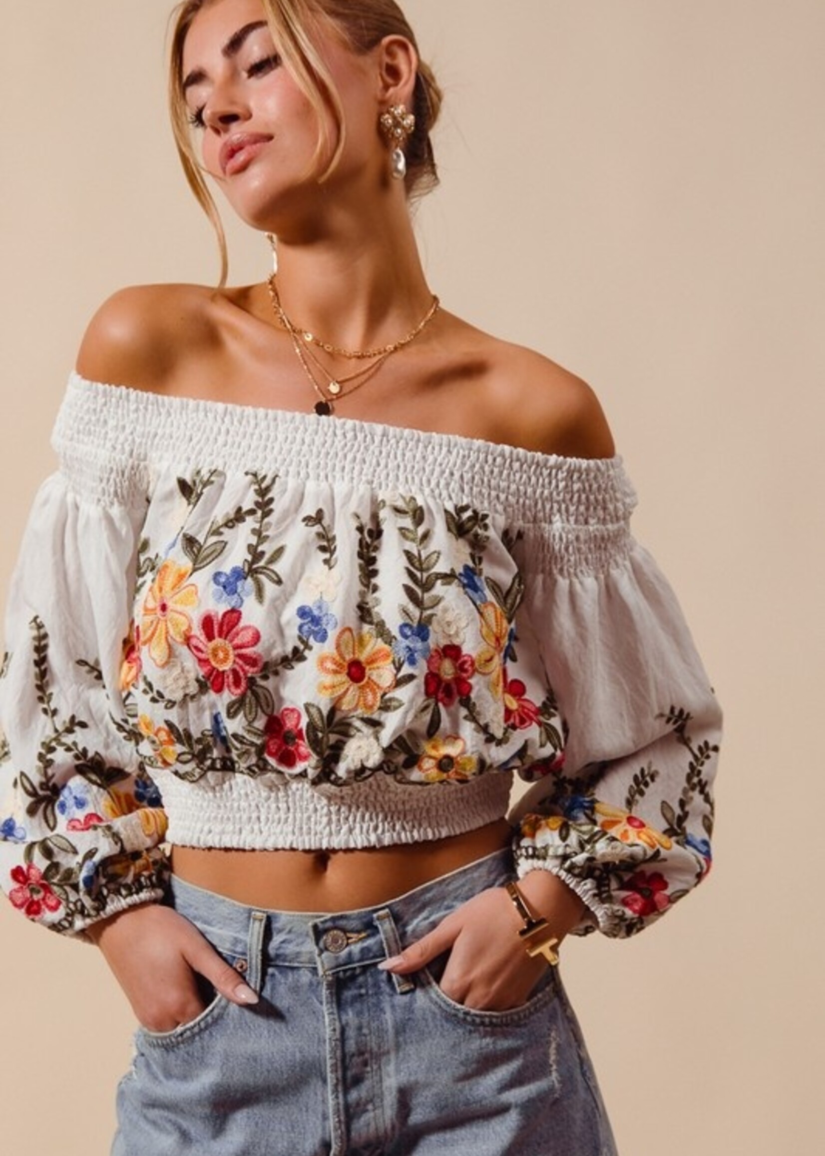 Embroidered off shoulder top