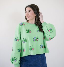 Queen of Sparkles Lime Green Easter Egg in Grass Sweatshirt