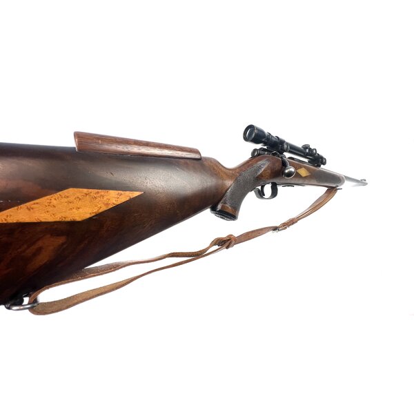 Winchester Model 75 22LR Repeater, Very Good Condition, Bore is Excellent, made in 1949, Stock customized with Dall Sheep Horn Inlays, Fitted with Weaver 4x 3/4" Scope