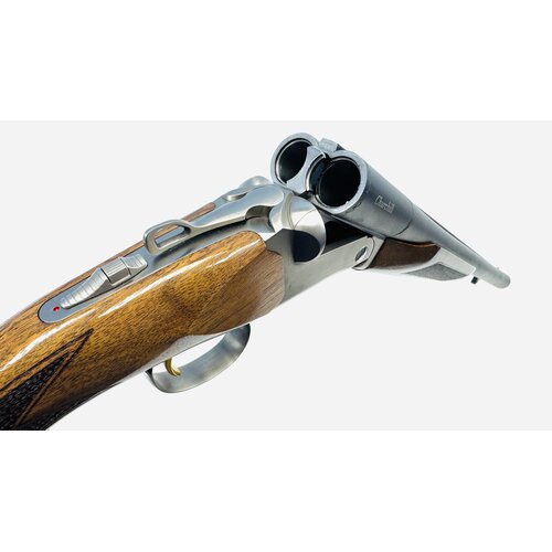 Akkar Churchill 12ga 3" SxS, 20" Blued Barrels, SS Receiver, Walnut Stock, Chokes, Very Good Condition Akkar Churchill 12ga 3" SxS, 20" Blued Barrels, SS Receiver, Walnut Stock, Chokes, Very Good Condition