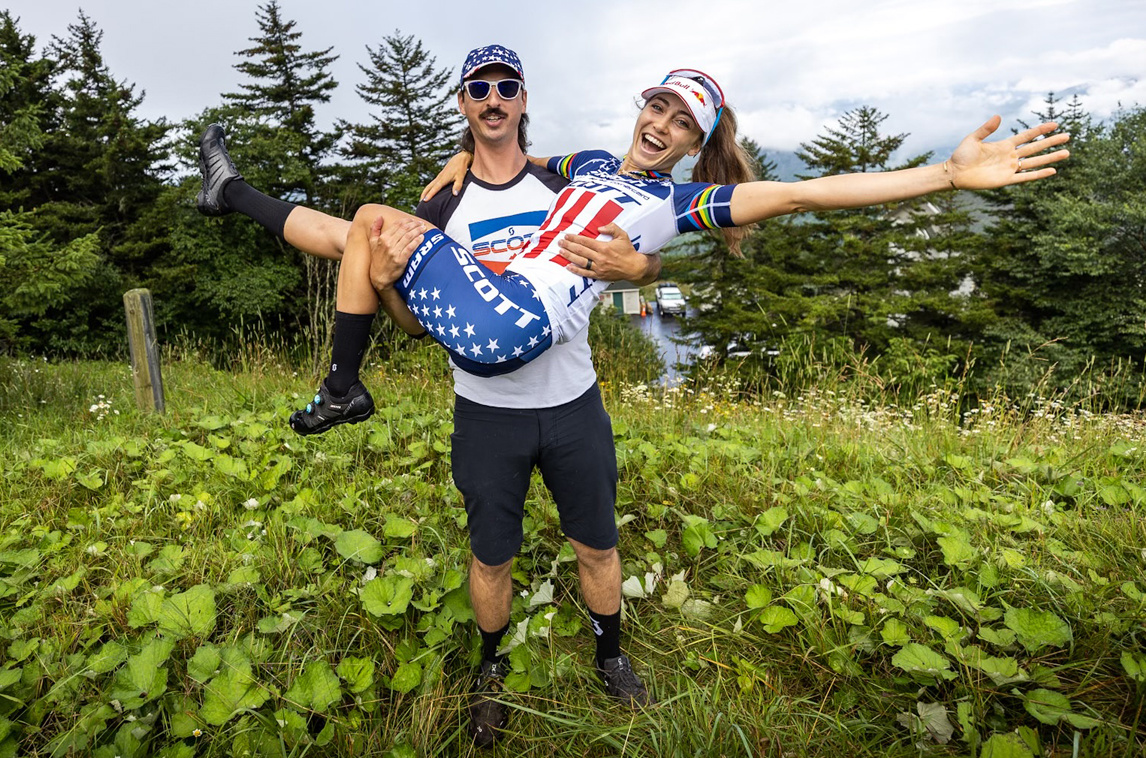 Hush Money Bikes Service Director Brad Copeland with professional mountain bike racer Kate Courtney at UCI Mountain Bike World Cup in 2022. Photo Credit: Will Nelson